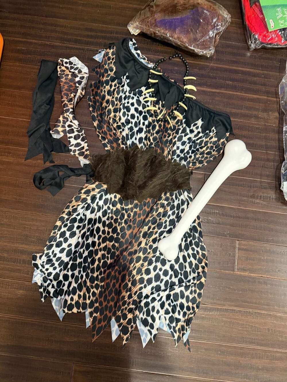 Party City Deluxe Cave Woman Wig and Costume Set